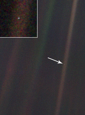 The Earth as photographed by Voyager 1 at a distance of 4 billion miles